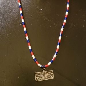 Patriotic silver charm on a beaded necklace